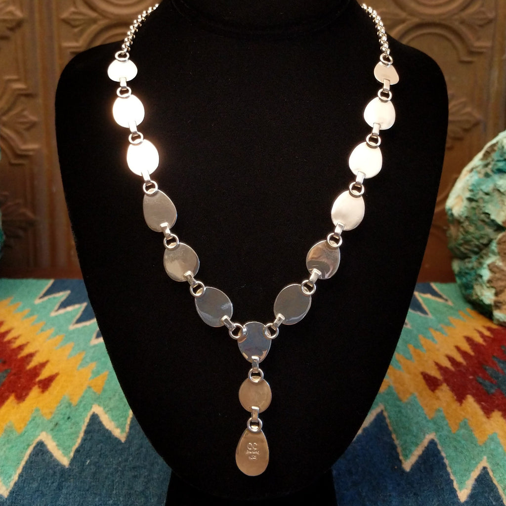 The back of the necklace is polished sterling silver.