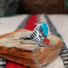 Turquoise and coral silver ring by Pauline Nelson with fan-shaped detailing.