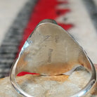 Close up of the artist's stamped signature