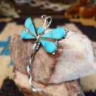 Sterling silver dragonfly pendant with turquoise set in the wings.