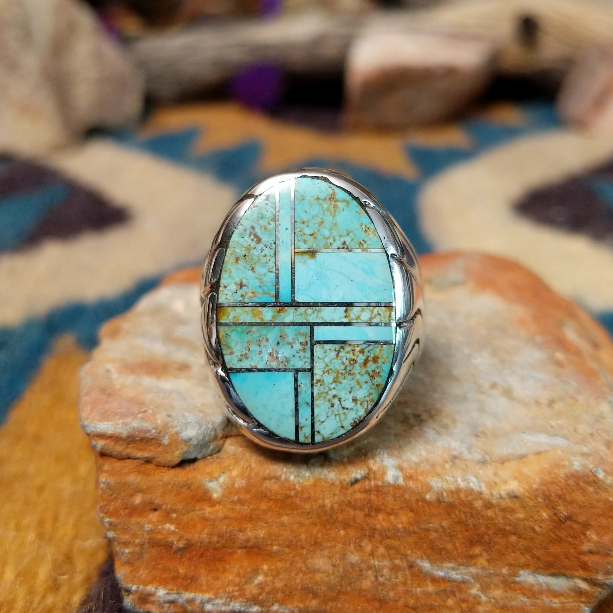 Sterling silver Turquoise inlay ring by Dennis Ramone with an oval geometric mosaic design.