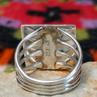 Navajo multistone mosaic shadowbox ring by A.Y. with geometric inlay and rectangular silver frame. Close up of the artist's stamped signature.