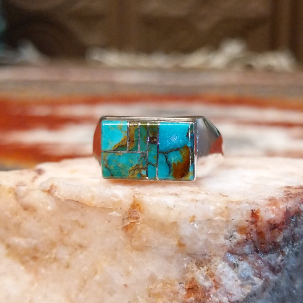 Rectangular turquoise inlay on the sterling silver ring.