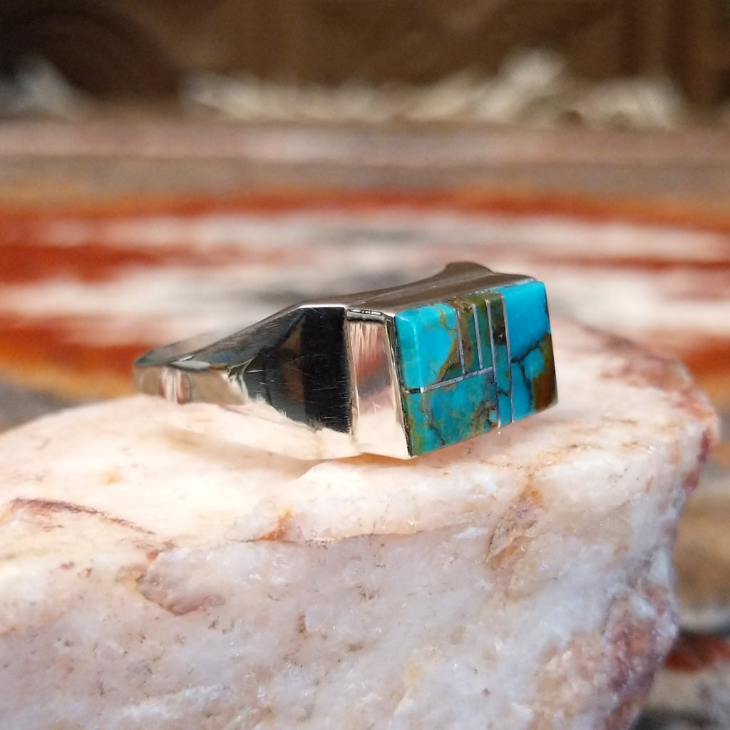Rectangular turquoise inlay on the sterling silver ring.