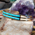 14k gold cuff by Steve Francisco with double row turquoise inlay.