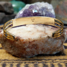 Interior view of handcrafted cuff showing band thickness and fit.