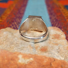 Turquoise & Lapis Inlay Ring by Wilbert Grey with geometric inlay and polished silver band.