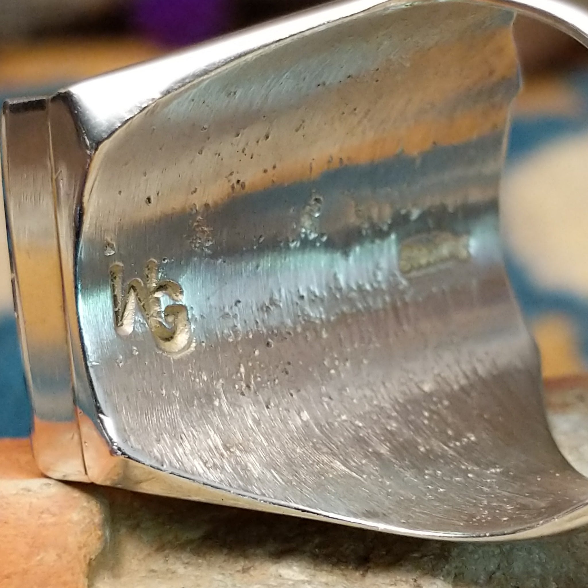 Sterling silver Navajo rectangle ring by Wilbert Grey featuring natural turquoise with black matrix and lapis lazuli geometric inlay in a polished signet-style setting; artisan and Sterling Silver stamp.