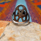 Turquoise Lattice Ring by Harry Morgan featuring an oval turquoise stone with natural matrix set in Sterling Silver, surrounded by bold sculpted lattice-style openwork; underside view.