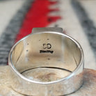 Close up of the artist's stamped signature