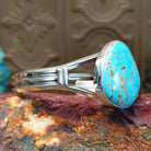 Sterling silver cuff features Turquoise Mountain turquoise set in a large bezel.