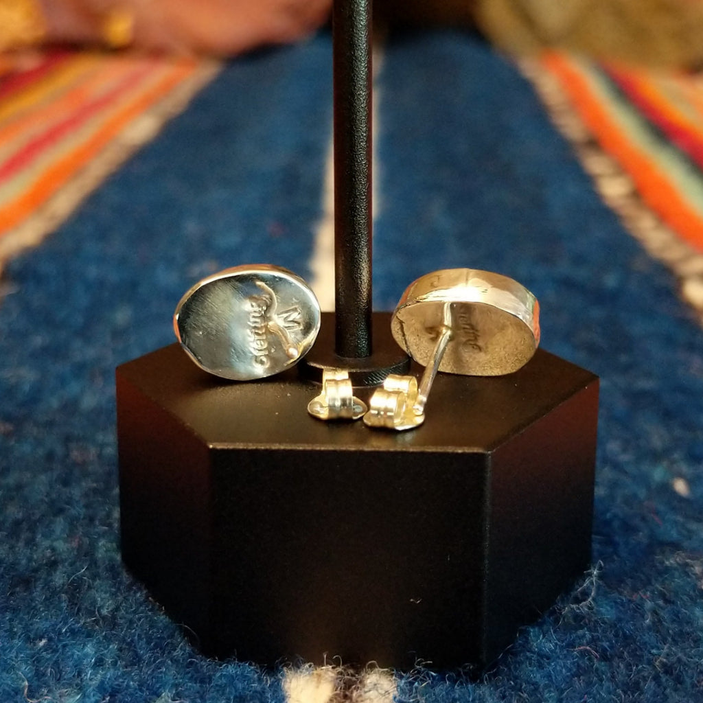 The back of the sterling silver bezels features the stud backings.