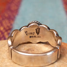 Close up of the artist's stamped signature