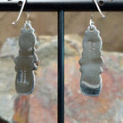 Handcrafted sterling silver turquoise and spiny oyster earrings by the Platero Family, featuring a three-stone dangle design with vibrant orange and blue gemstones; artisan and Sterling Silver stamp.