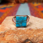 Turquoise Square Inlay Ring by Wilbert Grey featuring geometric turquoise inlay with natural matrix, separated by Sterling Silver channels and set on a polished tapered silver band.