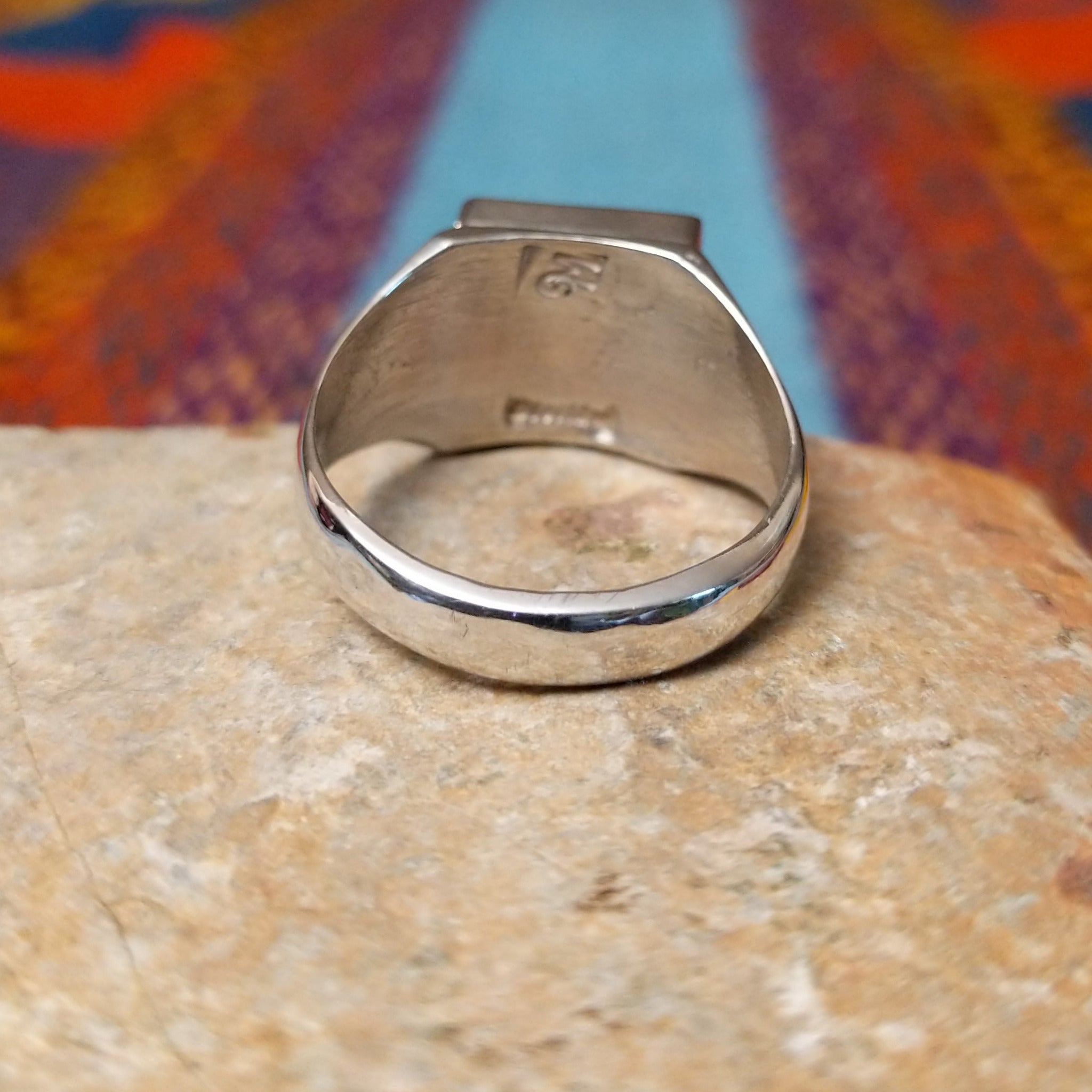 Turquoise Square Inlay Ring by Wilbert Grey featuring geometric turquoise inlay with natural matrix, separated by Sterling Silver channels and set on a polished tapered silver band; underside view.