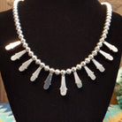 The back features the polished sterling silver bezels.