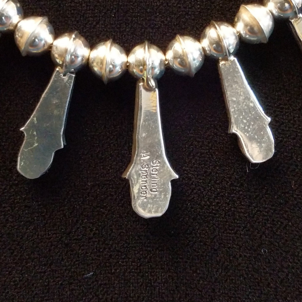 Close-up of the artisan's signature.