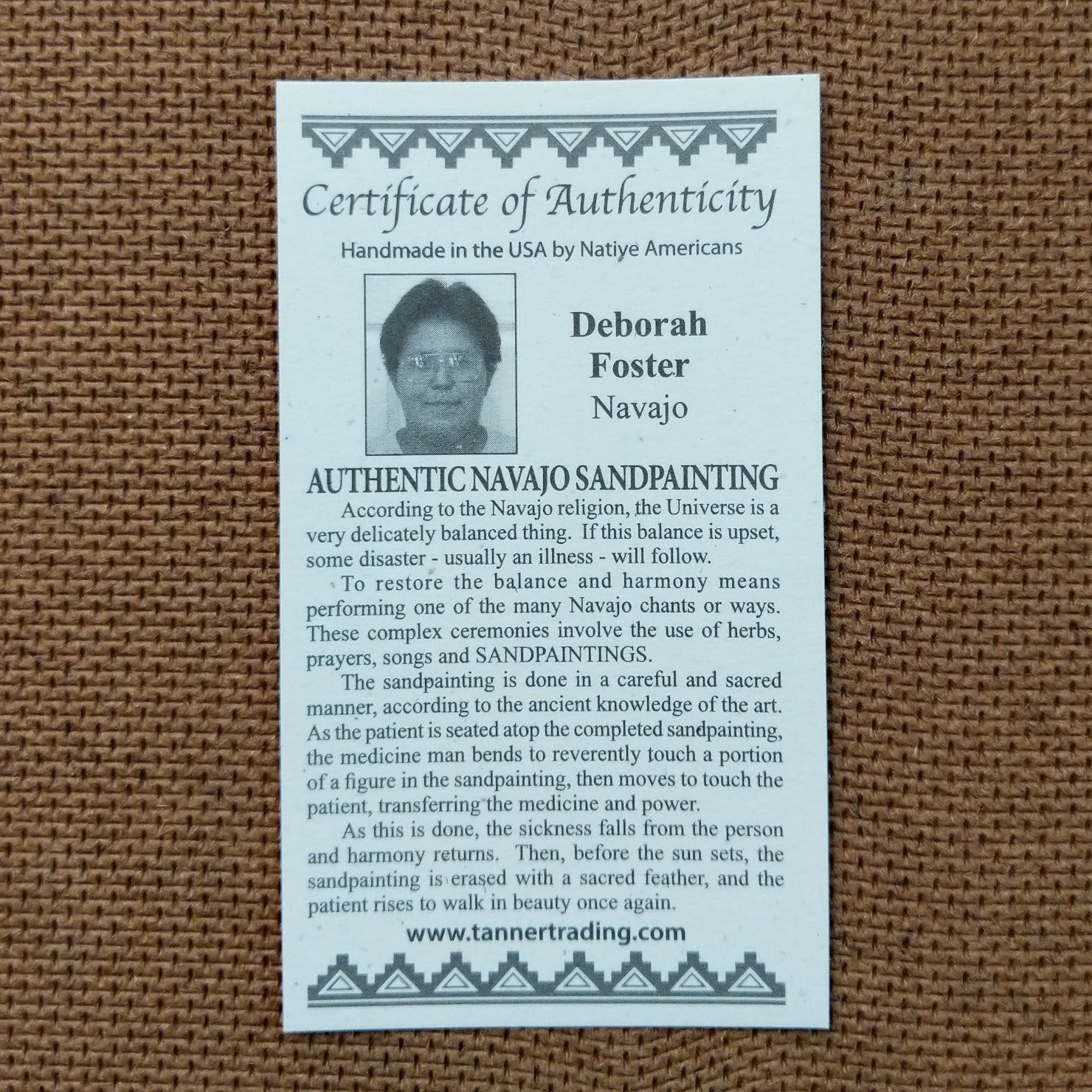 Close up of the Certificate of Authenticity and Artist information. 
