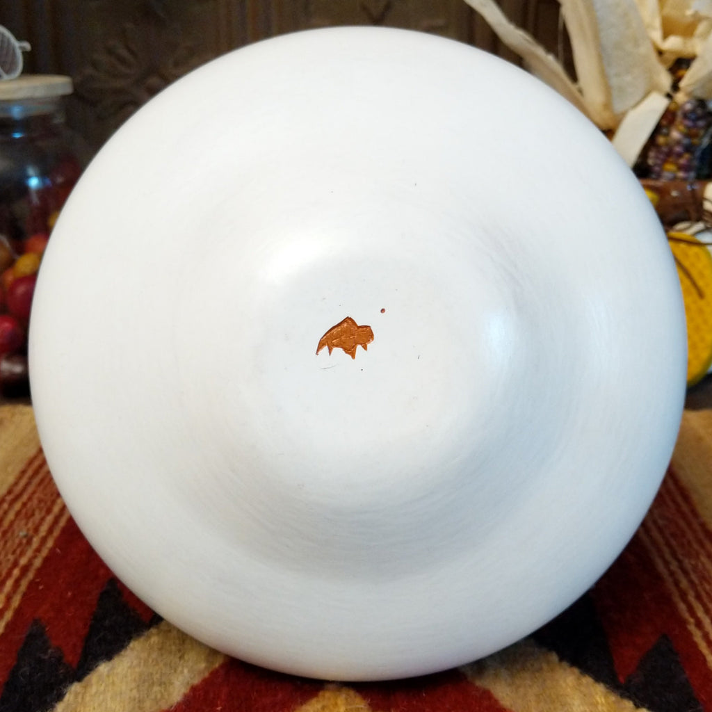 The buffalo trademark is found on the underside of the piece.