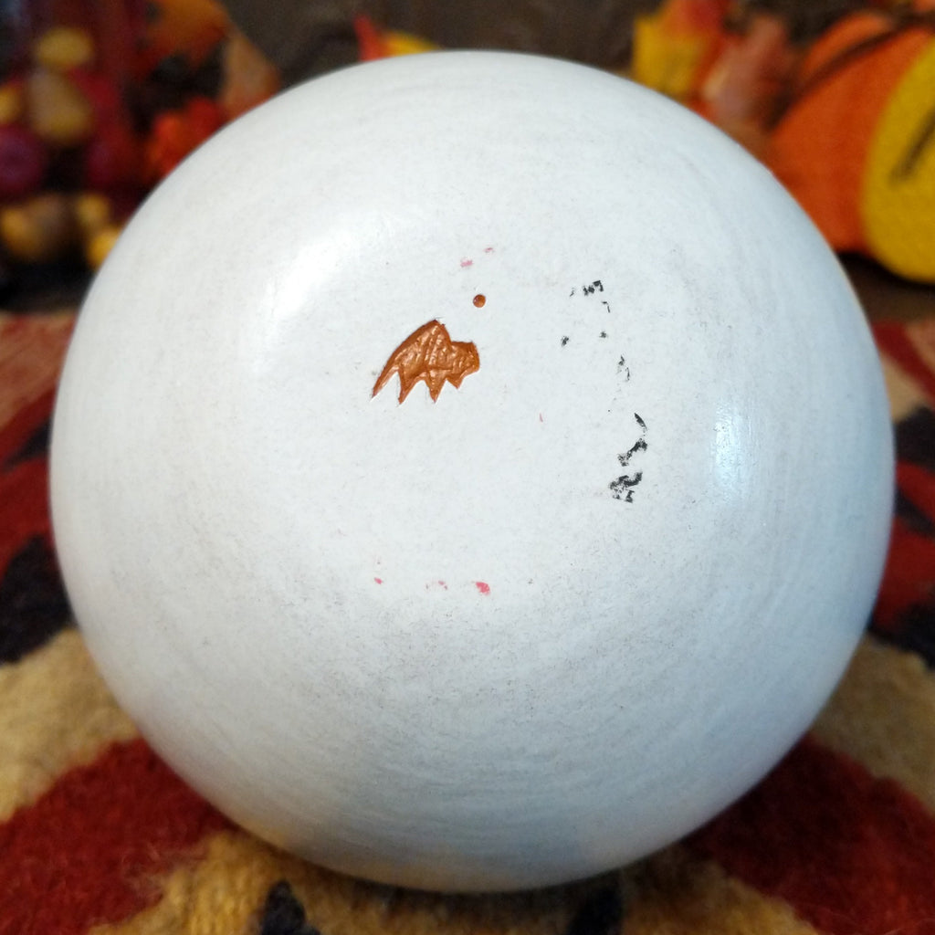 The buffalo trademark is found on the underside of the piece.