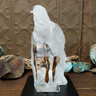 A frosted Lucite sculpture of a bald eagle with two hand-painted bald eagles soaring through the clear crystal interior.