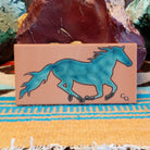 Tile art with jade watercolor horse.