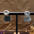 Close-up of the artisan's stamped signature.