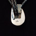 Back side view, featuring artisan stamp and Sterling Silver stamp.