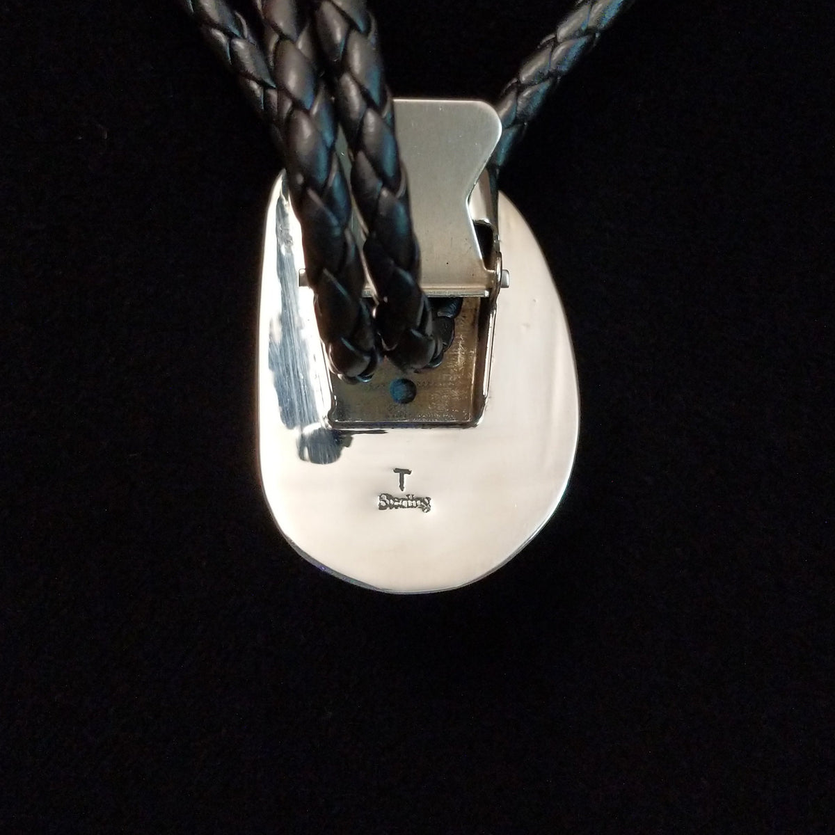 Back side view, featuring artisan stamp and Sterling Silver stamp.