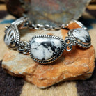 White Buffalo link bracelet by Terry Wood with natural black-and-white stones set in sterling silver.