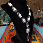 Southwestern-style Sterling Silver necklace and natural black and gray matrix; side view.
