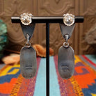 Artisan and Sterling Silver stamp.