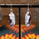 Sterling silver earrings with wild horse stones set in the eclipse bezels.