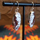 Sterling silver earrings with wild horse stones set in the eclipse bezels.