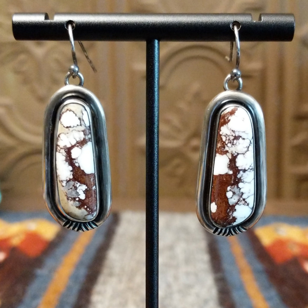 Wild horse stones set in sterling silver bezels that dangle.