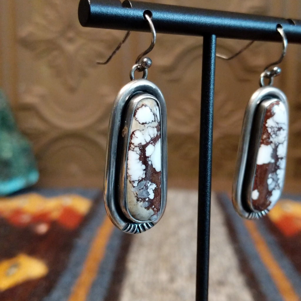 Wild horse stones set in sterling silver bezels that dangle.