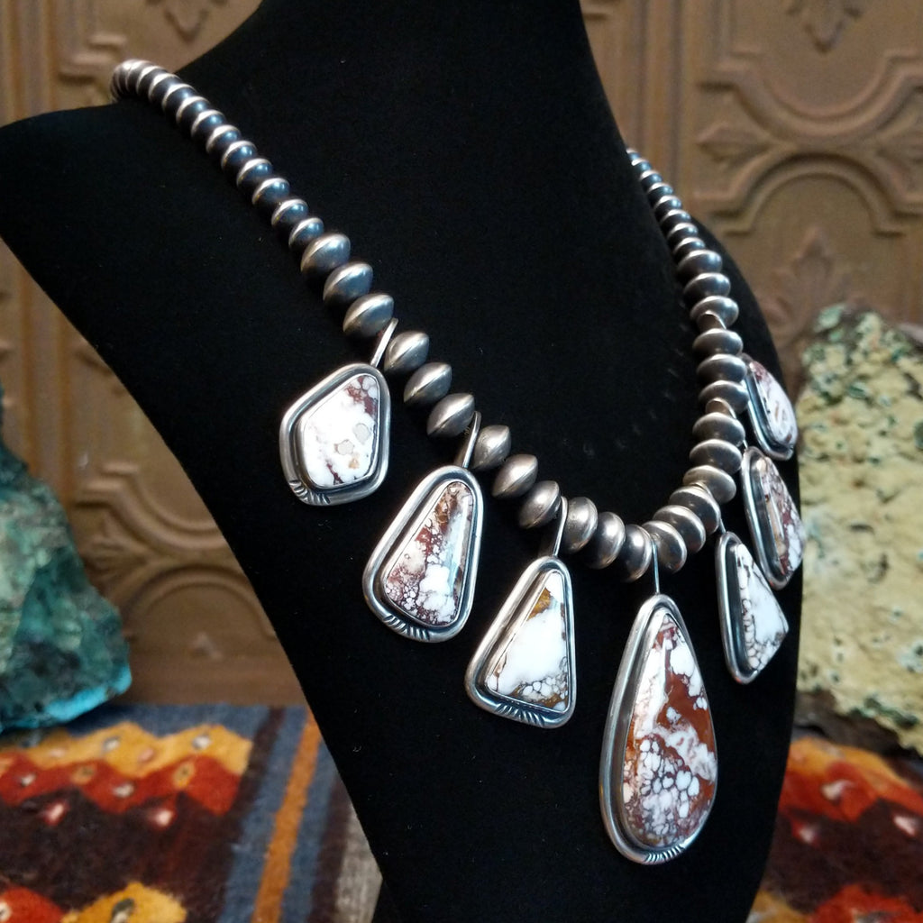 Wild horse stone's set in seven bezels on a beaded sterling silver chain.