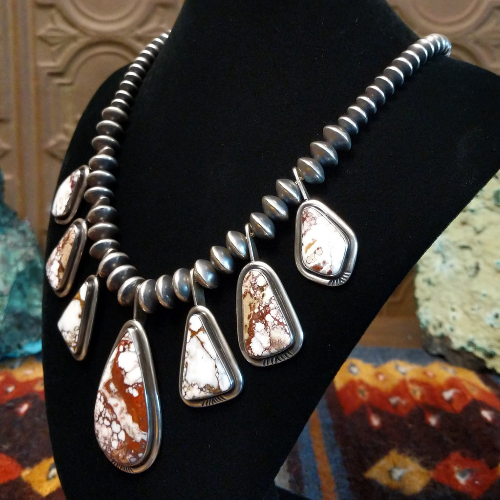Wild horse stone's set in seven bezels on a beaded sterling silver chain.