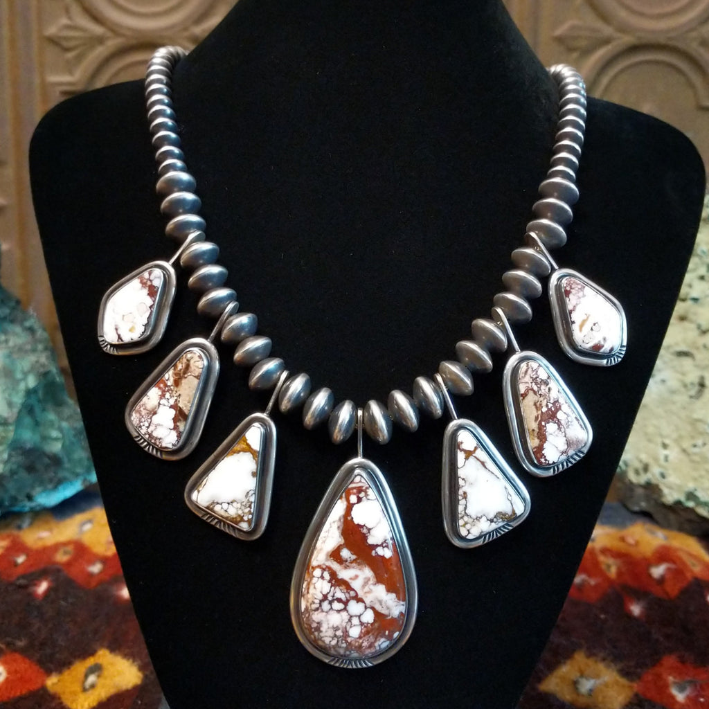 Wild horse stone's set in seven bezels on a beaded sterling silver chain.
