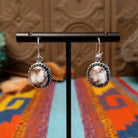 Wild Horse Sterling Silver earrings by Mary Ellen, featuring natural white, cream, brown, and reddish matrix stones in an intricate handcrafted design.