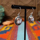 Wild Horse Sterling Silver earrings by Mary Ellen, featuring natural white, cream, brown, and reddish matrix stones in an intricate handcrafted design.