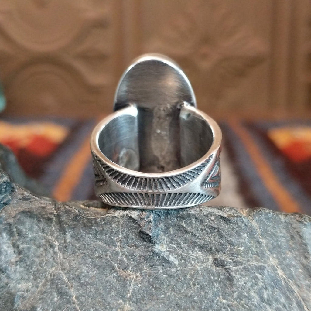 Intricately stamped band of the ring.