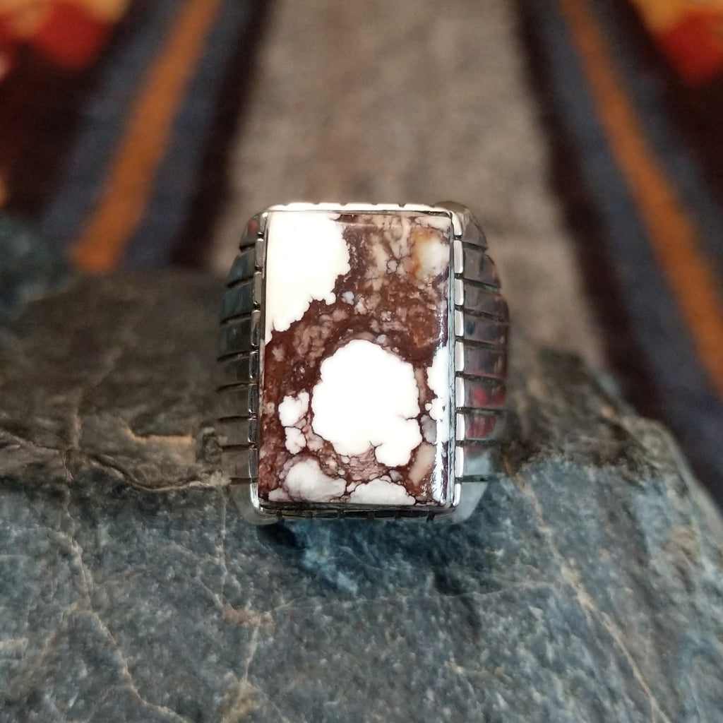 The rectangular wild horse stone is set in an incised sterling silver bezel.