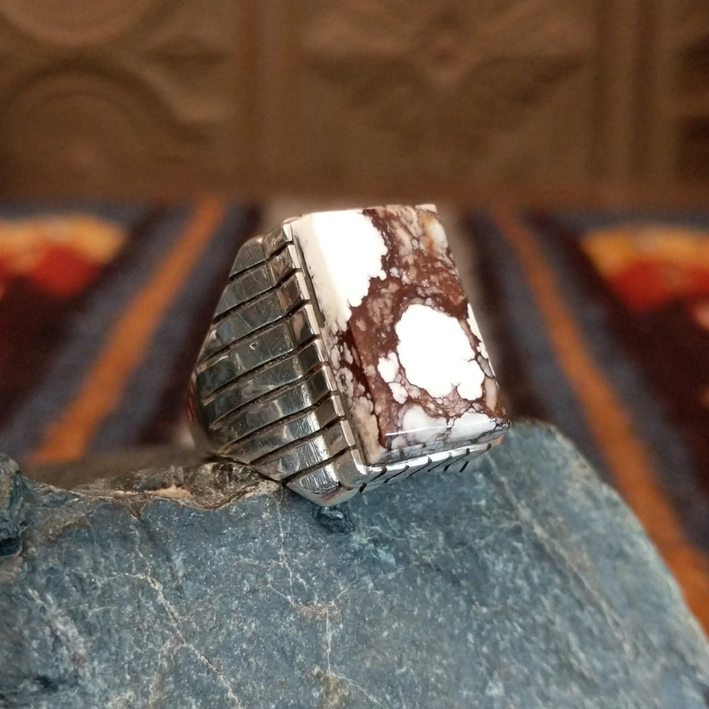 The rectangular wild horse stone is set in an incised sterling silver bezel.