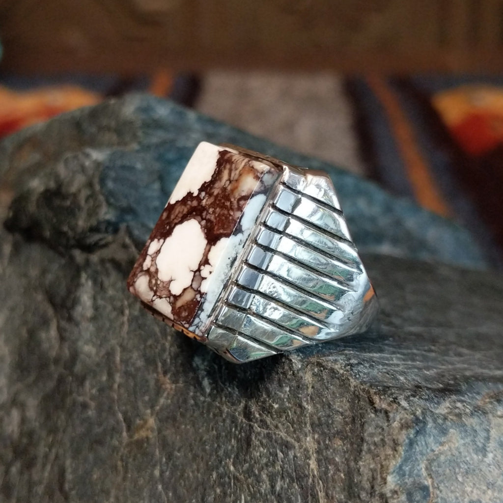 The rectangular wild horse stone is set in an incised sterling silver bezel.