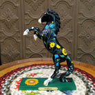 "Wildflower" collectible pony by The Trail of Painted Ponies, featuring detailed hand-painted floral artwork, vibrant colors, and nature-inspired design elements.