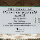 "Wildflower" collectible pony by The Trail of Painted Ponies, featuring detailed hand-painted floral artwork, vibrant colors, and nature-inspired design elements.  Production number.