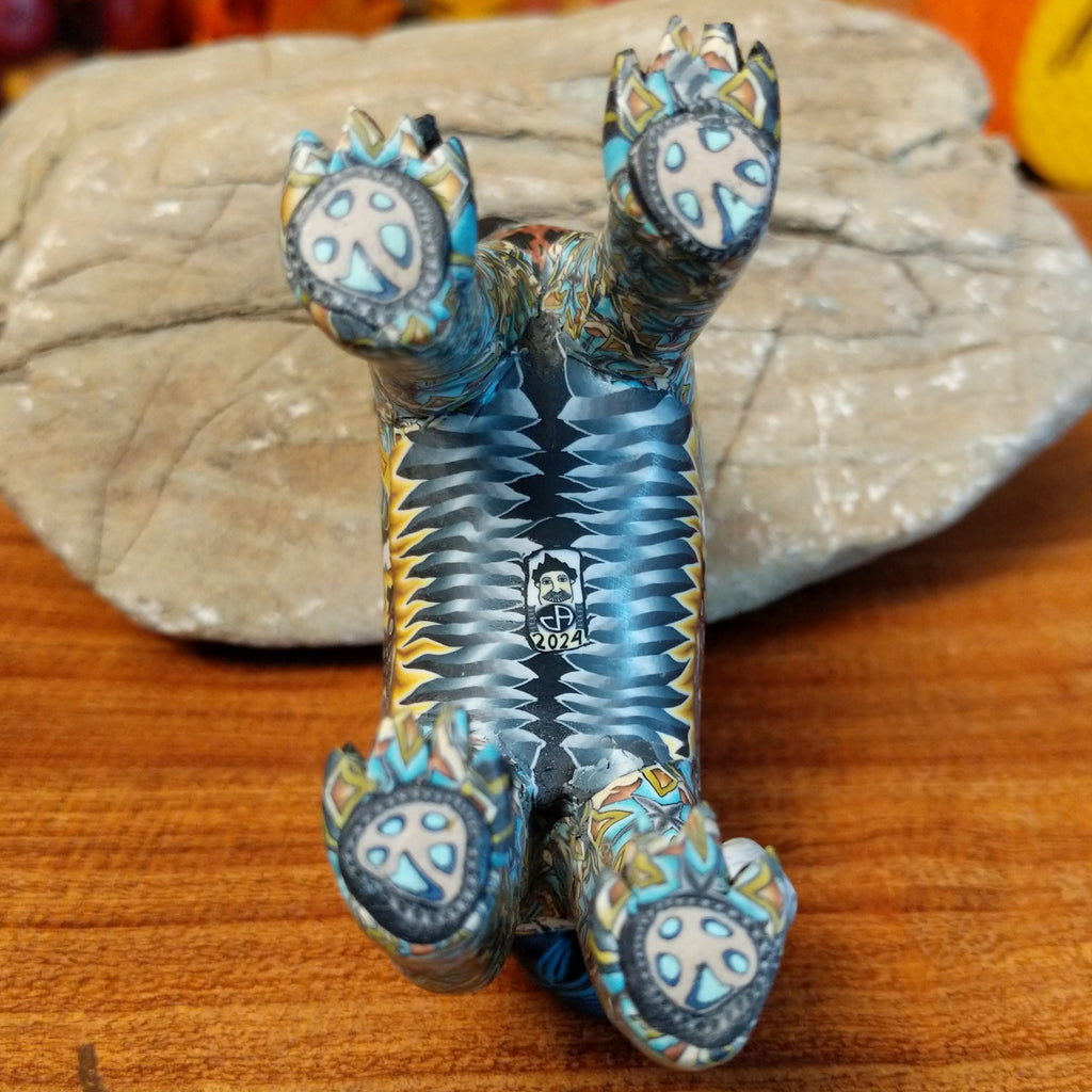 The underside of the piece showcases the year it was made.