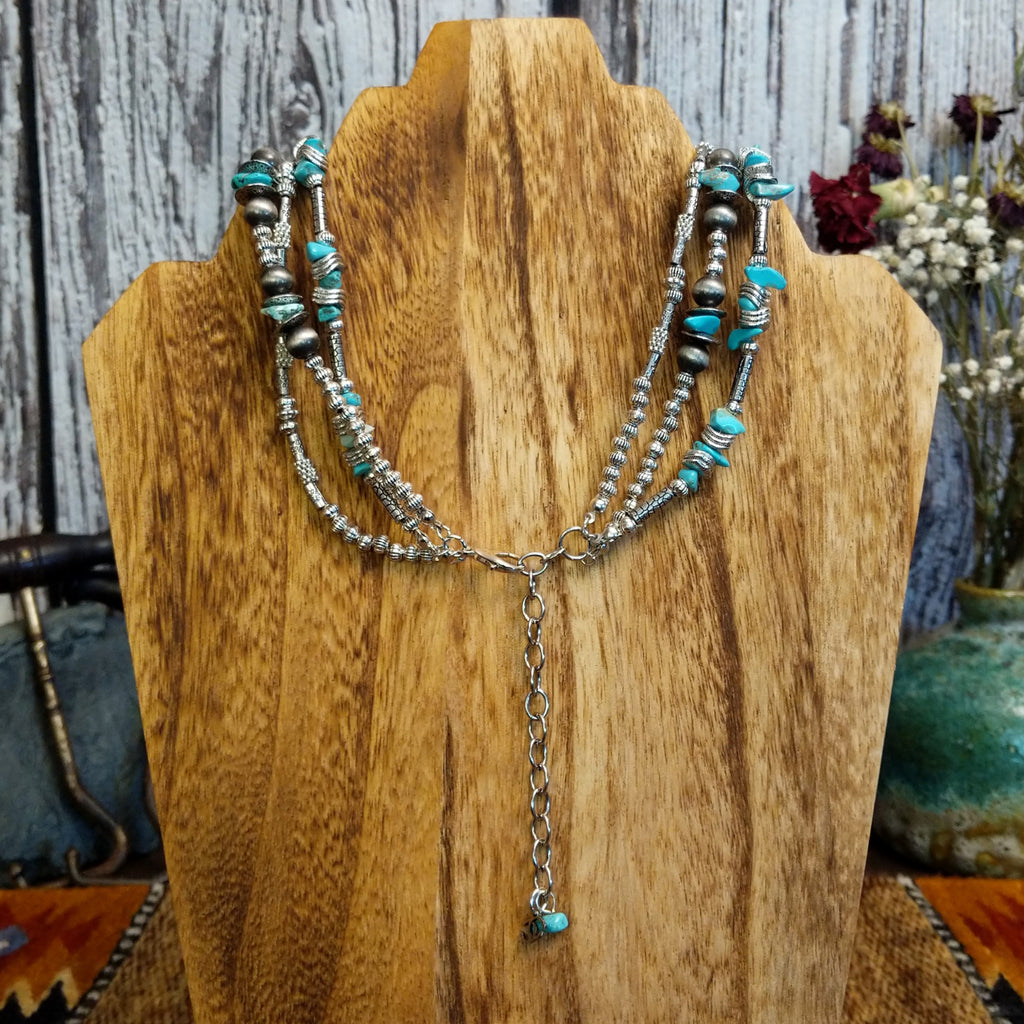 The back of the necklace features the adjustable chain and clasp.